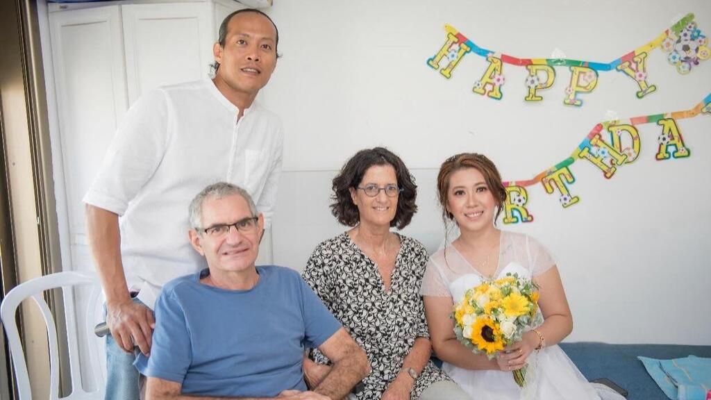 Jovel and her late husband, Paul, on their wedding day with Eviatar and the late Lilach (Photo: Courtesy of the family) ג'ובל ובעלה פול ז"ל ביום חתונתם עם אביתר (תרי) ולילך ז"ל