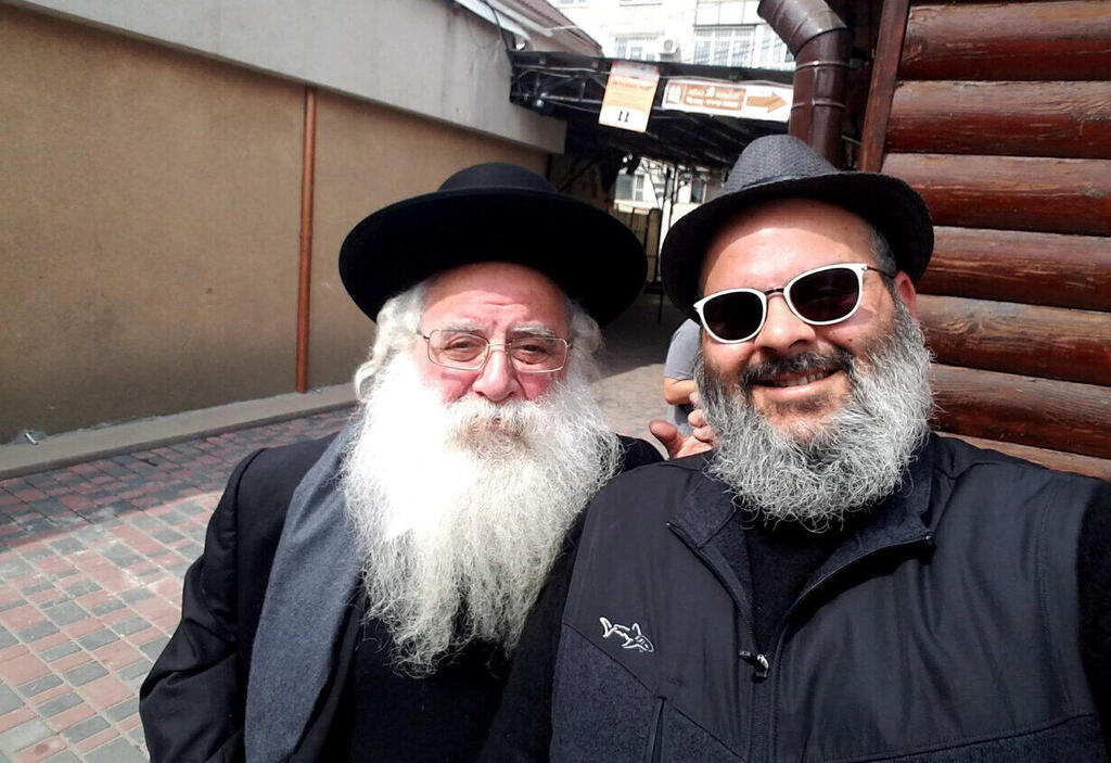 Yanki (right) and his father, Rabbi Haim Zilberman, in Uman יענקי ואביו הרב חיים זילברמן באומן
