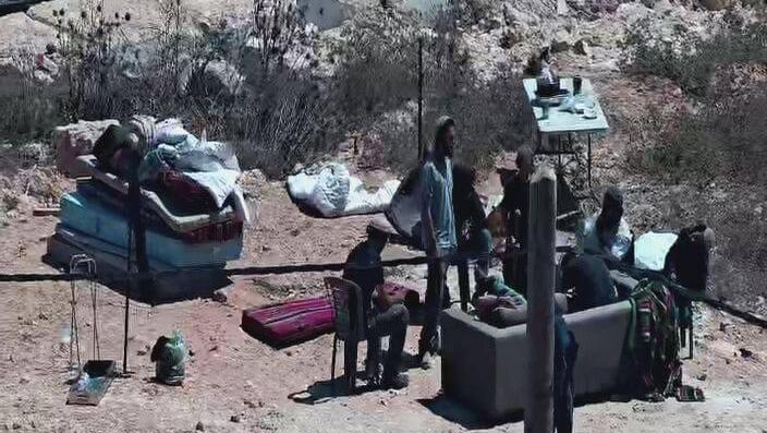 Settlers in the village of Qusra (Photo: Families under siege in Qusra) מתנחלים בכפר קוסרה