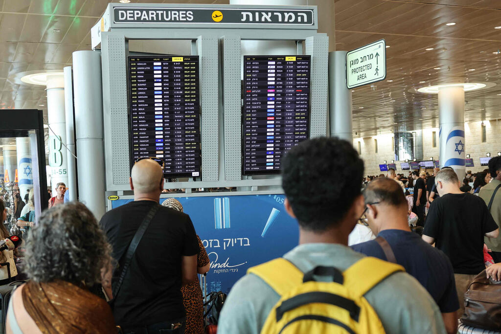 Photo: Jack GUEZ / AFP עומס בנתב"ג