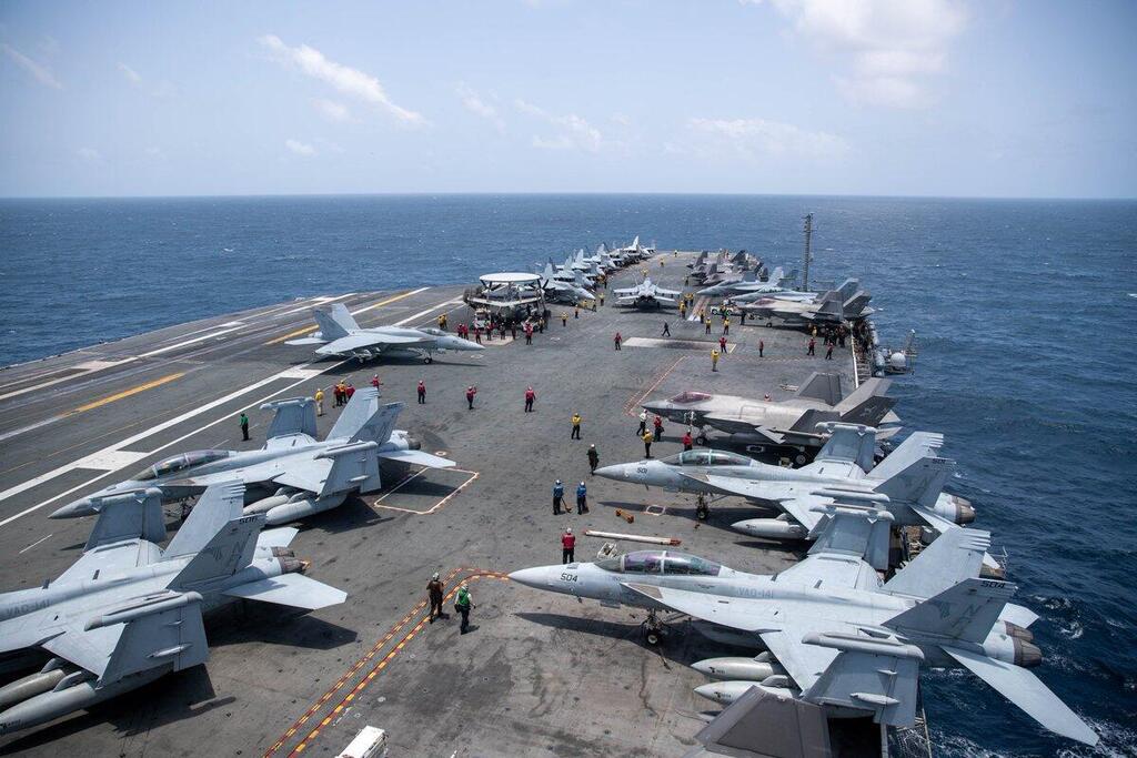 USS George Washington (Photo: CENTCOM) ושאת המטוסים ג'ורג' וושינגטון הגיעה למזרח התיכון