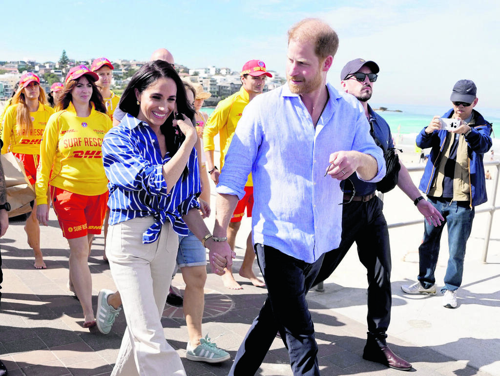 הארי ומייגן בביקור באוסטרליה (צילום: Jonathan Brady/Pool Photo/AP) הארי ומייגן בביקור באוסטרליה