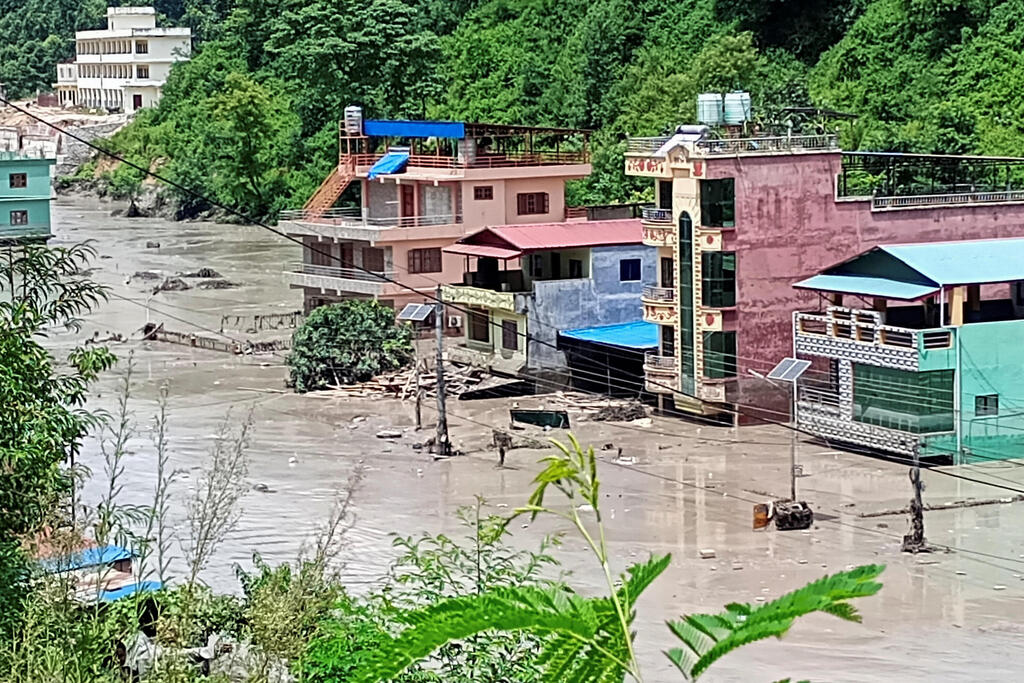A flooded road following a flash flood in Galchhi in the Dhading district, Nepal 