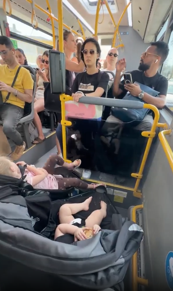 Learning how public transportation works around the city taking the bus