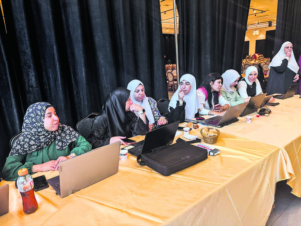 Delegate registration desk at the Ra’am conference עמדת רישום הצירים בוועידת רע"מ