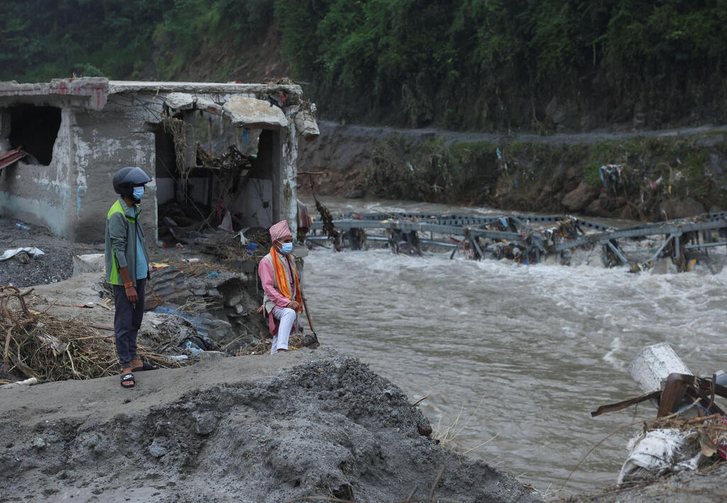 Flood damage in Nepal (Photo: REUTERS/Francis Mascarenhas) הנזקים בנפאל