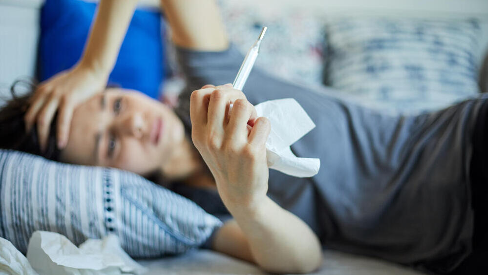 The flu virus is already here, but it is still unclear how severe this year’s season will be (Photo: Shutterstock) אישה חולה בשפעת