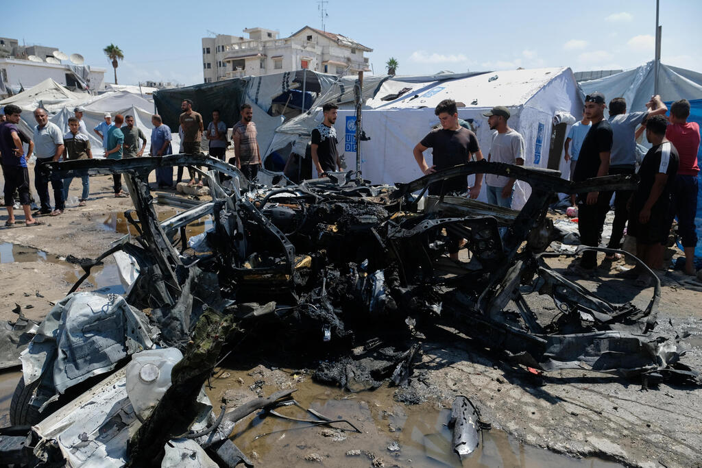 Photo: AP Photo/Jehad Alshrafi תקיפות במרחב העיר עזה ברצועה