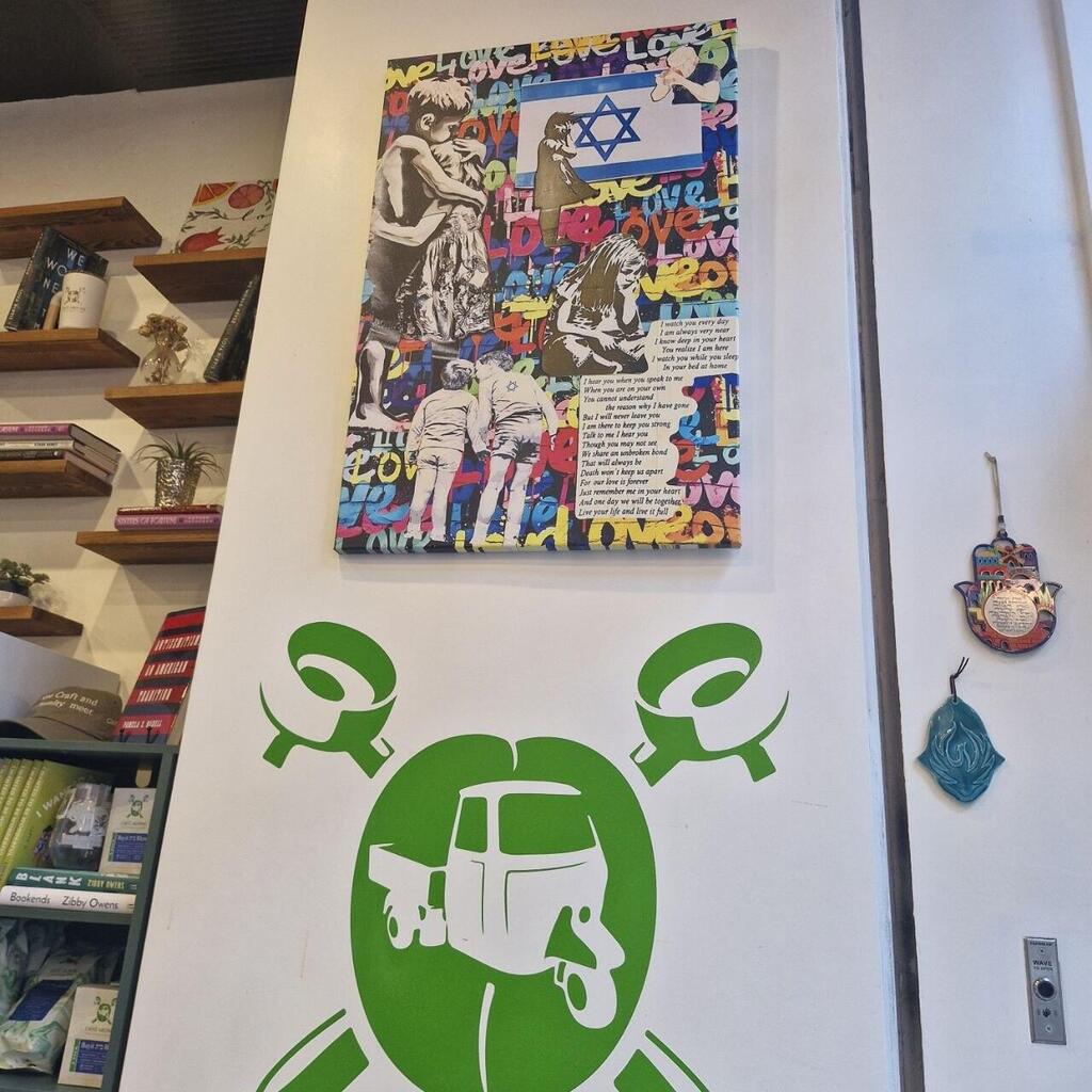 Caffè Aronne; Jewish and Israeli imagery adorns the café walls (Photo: Lior Ben Ari) קפה ארון