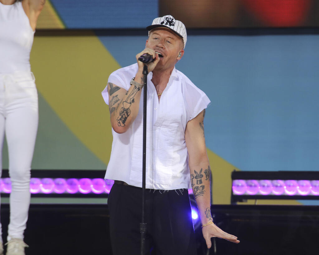 Macklemore (Photo: Andy Kropa/Invision/AP) מקלמור