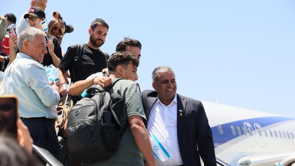 Aliyah and Integration Minister Ofir Sofer with some of the olim 