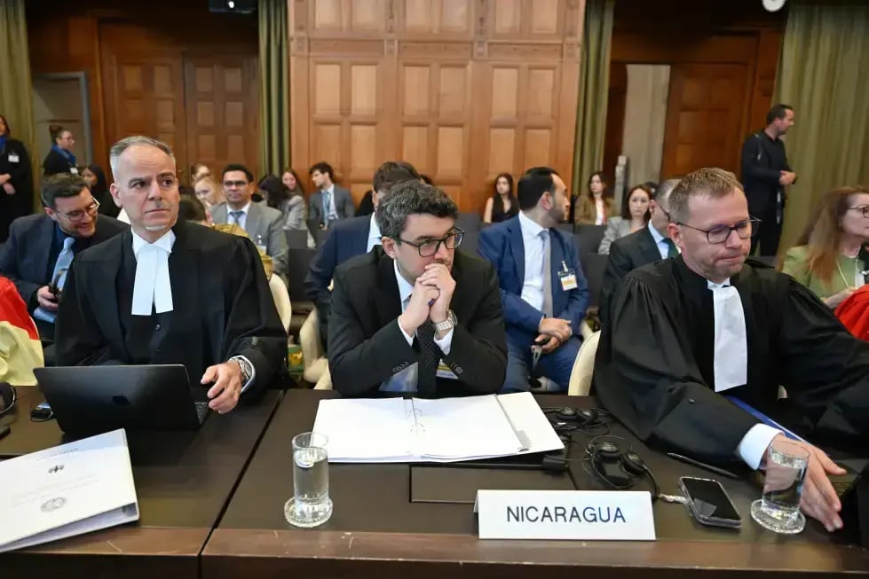 Members of the legal delegation representing Nicaragua, including counsel and advocate Daniel Mueller, right, attend public hearings on the preliminary objections raised by Germany in the case brought by Nicaragua at the International Court of Justice (ICJ) at the Peace Palace in The Hague, Netherlands (Photo: AP) Members of the legal delegation representing Nicaragua, including counsel and advocate Daniel Mueller, right, attend public hearings on the preliminary objections raised by Germany in the case brought by Nicaragua at the International Court of Justice (ICJ) at the Peace Palace in The Hague, Netherlands