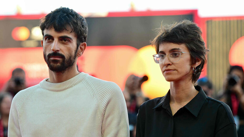 Yuval Abraham and Rachel Szor (Photo: Stefano Rellandini / AFP) יובל אברהם ורחל שור