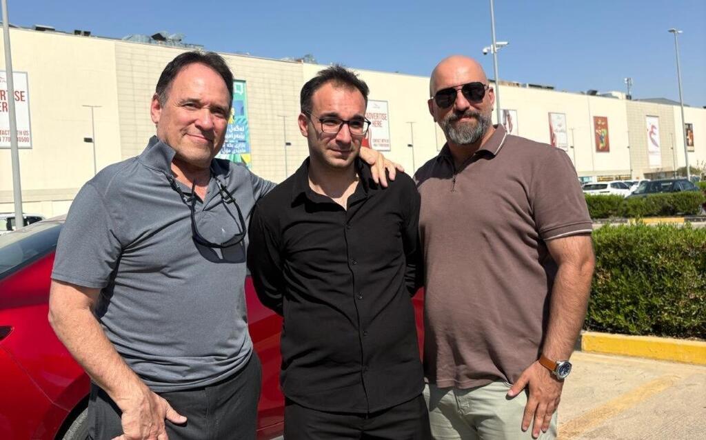 From left: attorney Alan Lowy, Ben Hassin and a local attorney בן חסין