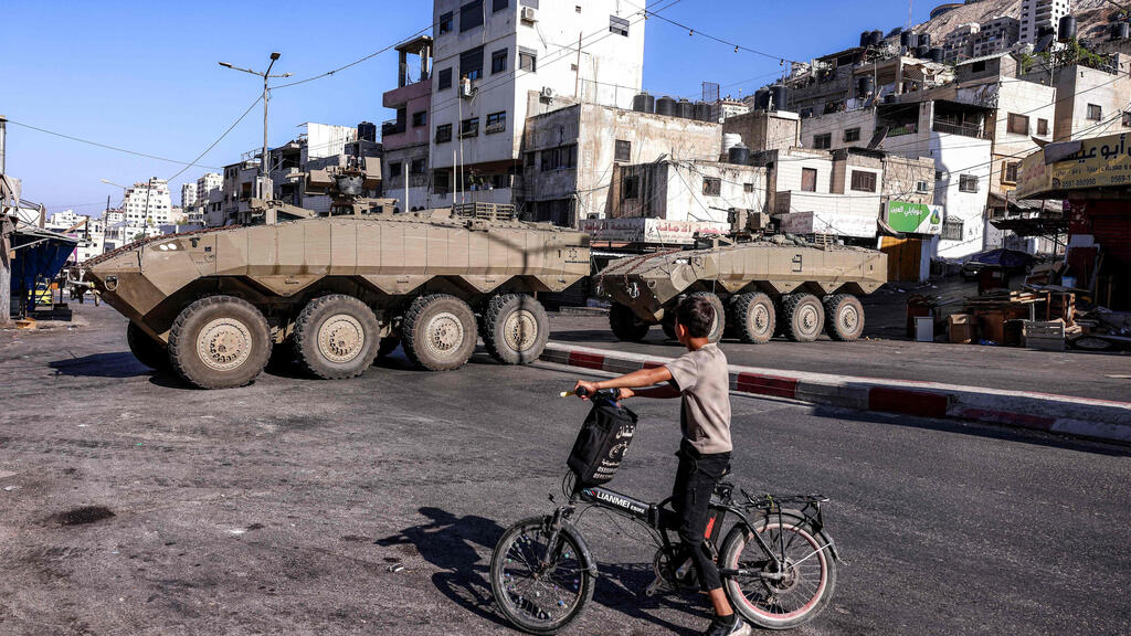 Photo: Zain JAAFAR / AFP חיילים צה"ל במחנה פליטים ליד שכם