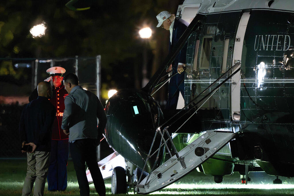 US President Donald Trump returns to the White House after cutting Camp David stay short (Photo: Jim WATSON / AFP) טראמפ חוזר לבית הלבן