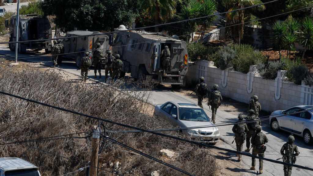 IDF troops in Biddu, West Bank (Photo: REUTERS/Mohammed Torokman) כוחות צה"ל בבידו