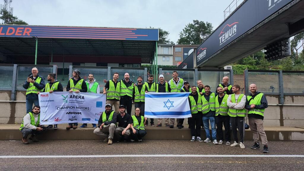 AFEKA Racing team members pose with an Israeli flag at the iLumen European Solar Challenge in Belgium (Photo: Afeka College of Engineering) AFEKA Racing team members pose with an Israeli flag at the iLumen European Solar Challenge in Belgium