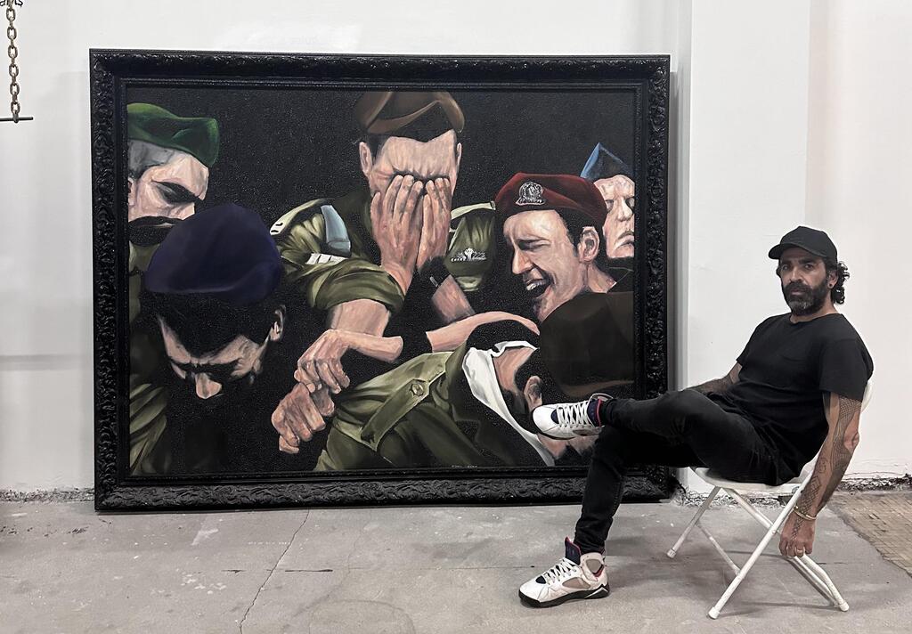 Tomer Peretz alongside his work Funeral (2011) (Photo: Courtesy of Tomer Peretz) תומר פרץ לצד יצירתו, Funeral (2011)