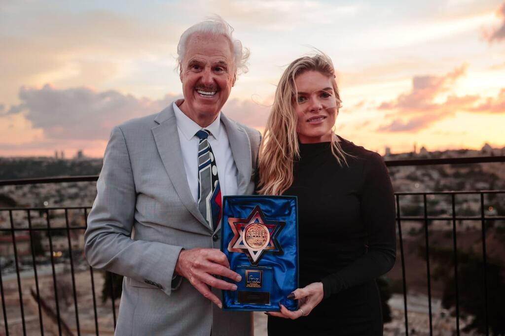 Friends of Zion founder Mike Evans with Australian broadcaster Erin Molan, one of the hosts of the 24-hour broadcast from Jerusalem (Photo: Courtesy) Friends of Zion founder Mike Evans with Australian broadcaster Erin Molan, one of the hosts of the 24-hour broadcast from Jerusalem