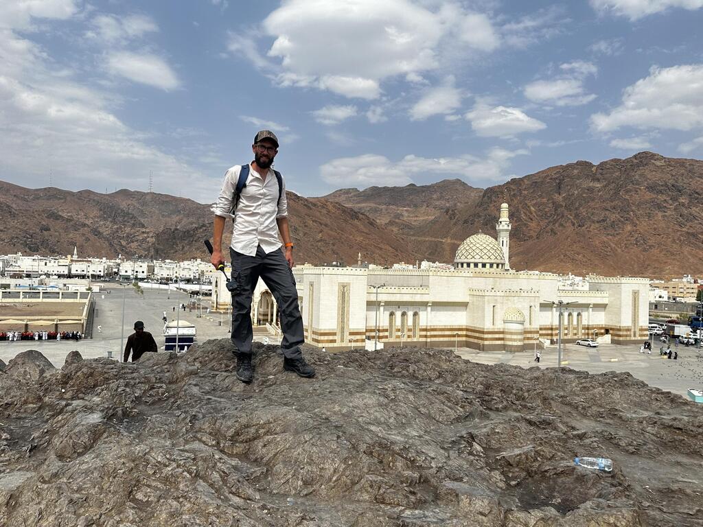 Adam with the Old City in the background (Photo: Courtesy of Adam Jano) אדם על רקע העיר העתיקה מדינה