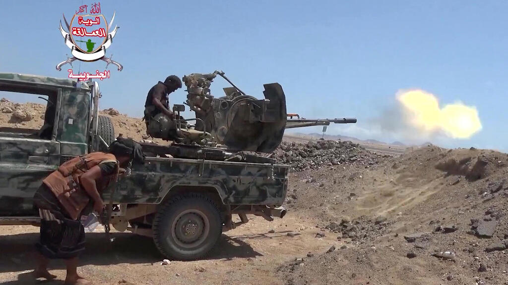 Pro-Saudi government forces in Yemen in fighting in the Taiz region (Photo: YEMEN SOUTHERN GIANTS BRIGADES MEDIA CENTRE/AFP) כוחות הממשלה הפרו-סעודית ב תימן בקרבות באזור תעז