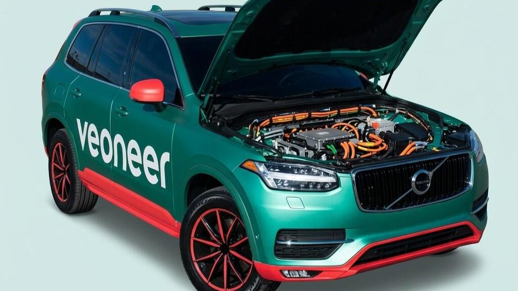 Veoneer-branded Volvo SUV with its hood open, exposing the vehicle's electrical systems (Photo: Courtesy) Veoneer-branded Volvo SUV with its hood open, exposing the vehicle's electrical systems