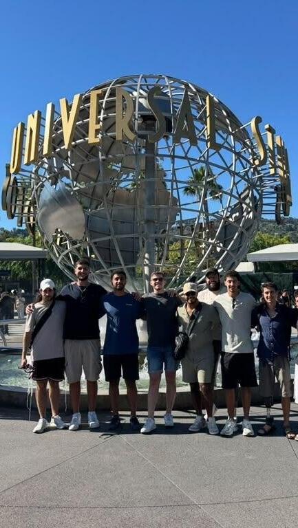 Eight wounded IDF soldiers pose outside Universal Studios Hollywood during an eight-day Los Angeles retreat organized by Belev Echad, offering respite from rehabilitation and the lingering effects of war 