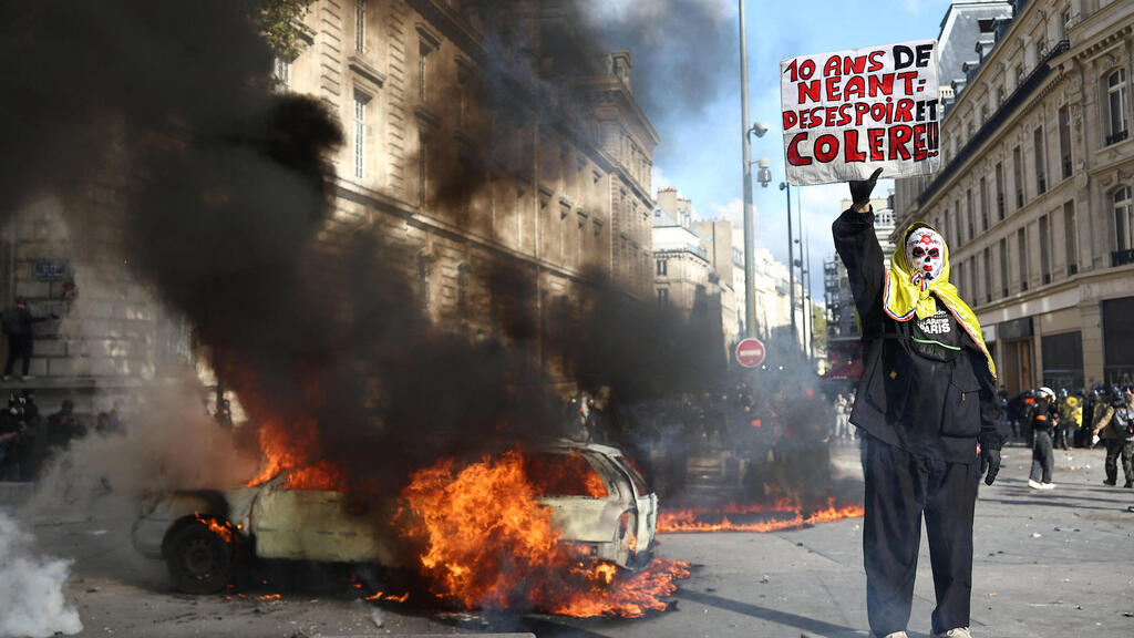 Photo: REUTERS/Abdul Saboor צרפת מהומות פריז 17 באוקטובר