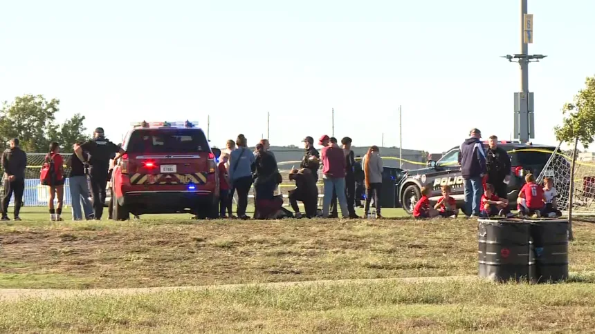 The scene in Kansas (Photo: Wyatt Glosson/KAKE-TV/AP) מגרש כדורגל בעיר וויצ'יטה, קנזס, שבו נדרסו למוות גבר וילד