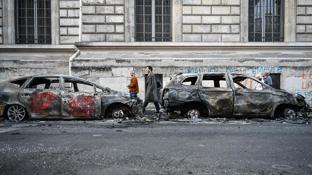 Photo: Matthieu RONDEL / AFP נזק צרפת מהומות פריז