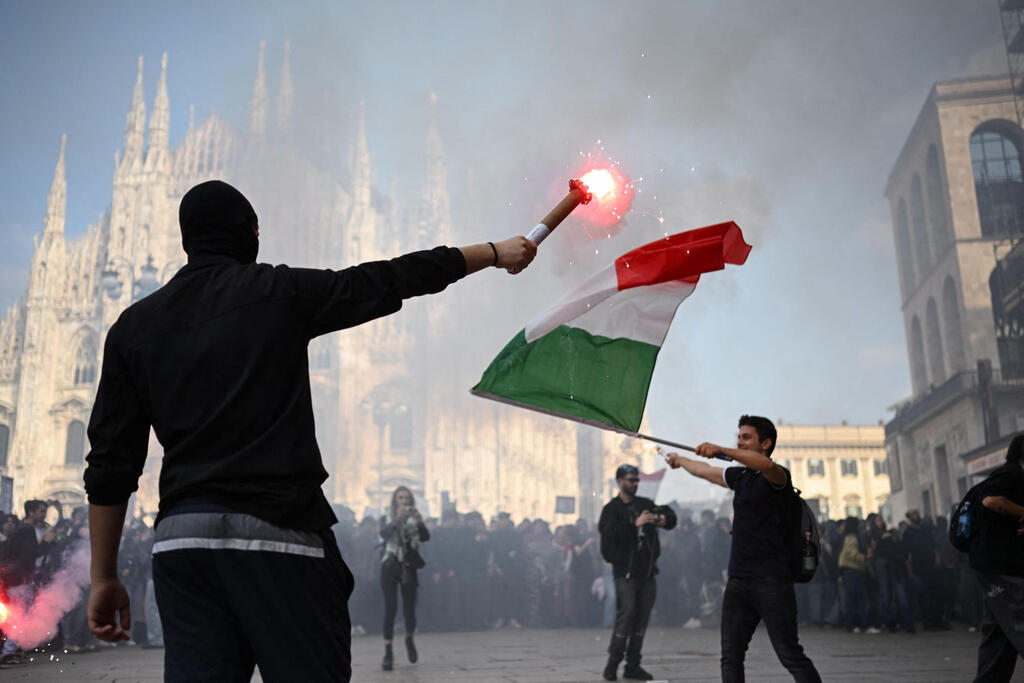 Photo: Piero CRUCIATTI / AFP 17 באוקטובר מהומות מילאנו איטליה