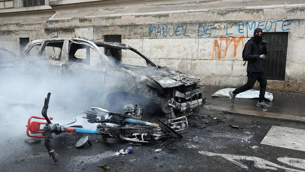 Photo: REUTERS/Abdul Saboor צרפת פריז מהומות 17 אוקטובר
