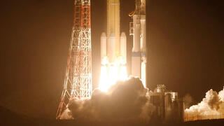 The H3 rocket, carrying the Martian Moons eXploration (MMX) spacecraft, is launched at the Tanegashima Space Center in Kagoshima Prefecture 