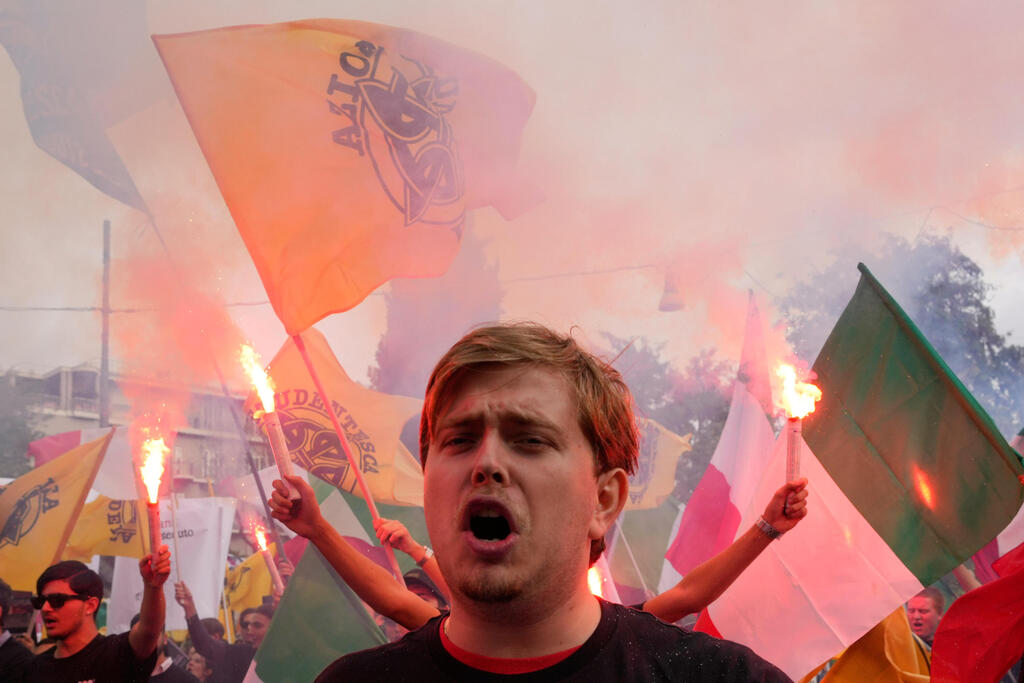 Protesters march through Rome on Saturday (Photo: AP Photo/Gregorio Borgia) רומא