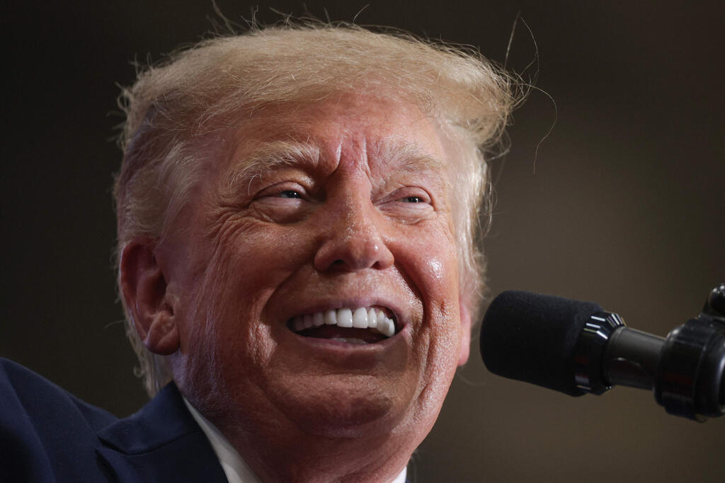 US President Donald Trump (Photo: ALEX WONG / GETTY IMAGES NORTH AMERICA / AFP) נשיא ארה"ב טראמפ ב עצרת ב בחירות אמצע ב מישיגן 25 באוקטובר