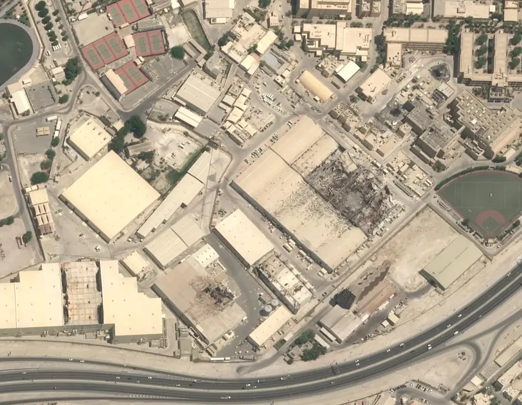 This satellite image taken over Naval Support Activity Bahrain on July 23, 2026, displaying extensive damage to the satellite communications system and warehouses (Photo: Airbus DS 2026 via AP) This satellite image taken over Naval Support Activity Bahrain on July 23, 2026, displaying extensive damage to the satellite communications system and warehouses
