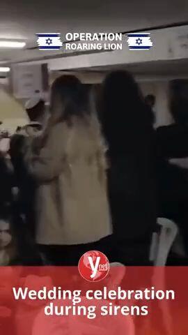 Wedding celebration during sirens