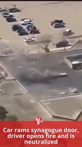 Car rams synagogue door