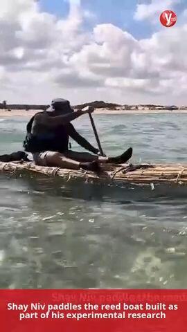 Shay Niv paddles boat vertical