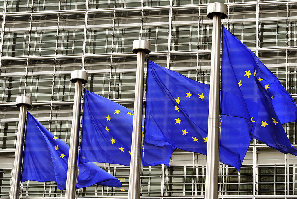 European Union flags outside the European Parliament in Brussels, Belgium 