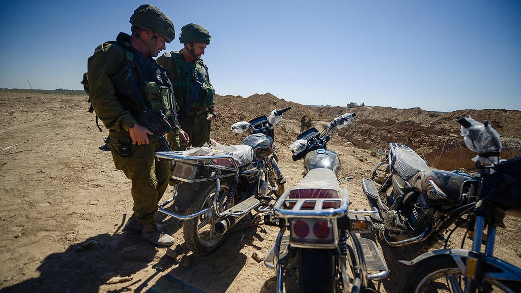 IDF forces with motorcycles found in Gaza tunnels (Photo: IDF Spokesperson's Unit) IDF forces with motorcycles found in Gaza tunnels