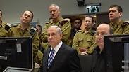 גנץ לצד שר הביטחון ורה"מ במהלך המבצע