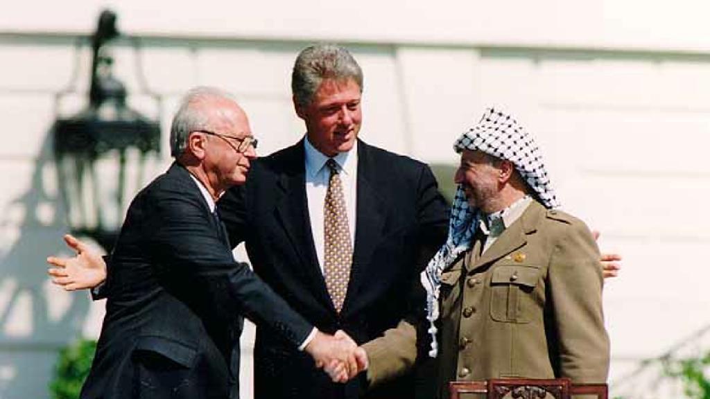 Prime Minister Yitzhak Rabin, President Clinton and Yasser Arafat sign the Oslo Accords at the White House 