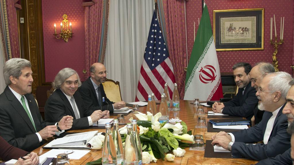 Then-U.S. Secretary of State John Kerry and Iranian Foreign Minister Mohammad Javad Zarif during the 2015 nuclear deal talks 