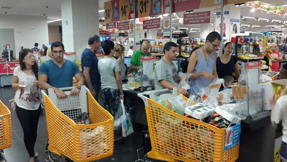 Shoppers in a Tel Aviv supermarket 