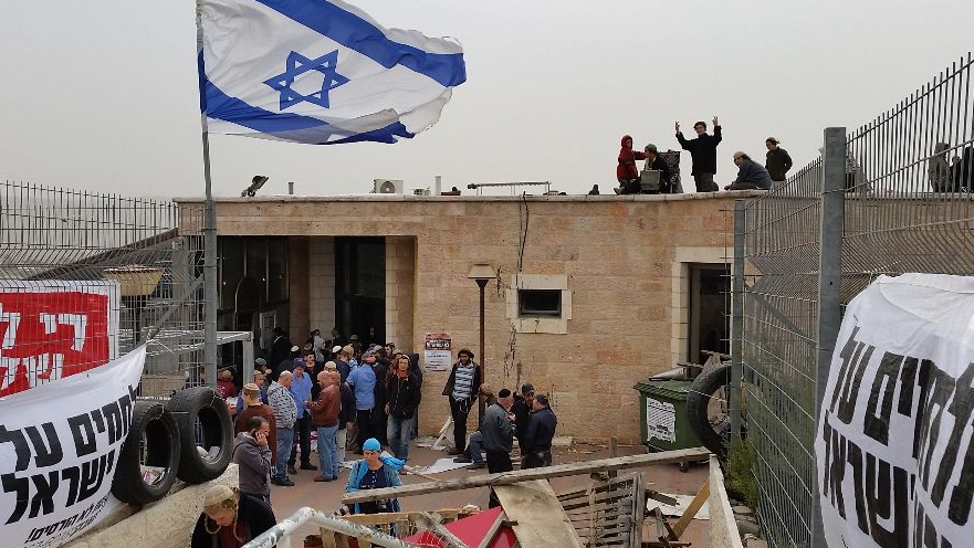 A synagogue build illegally on private Palestinian land is occupied by extreme settlers to prevent its demolition, Nov. 2015 