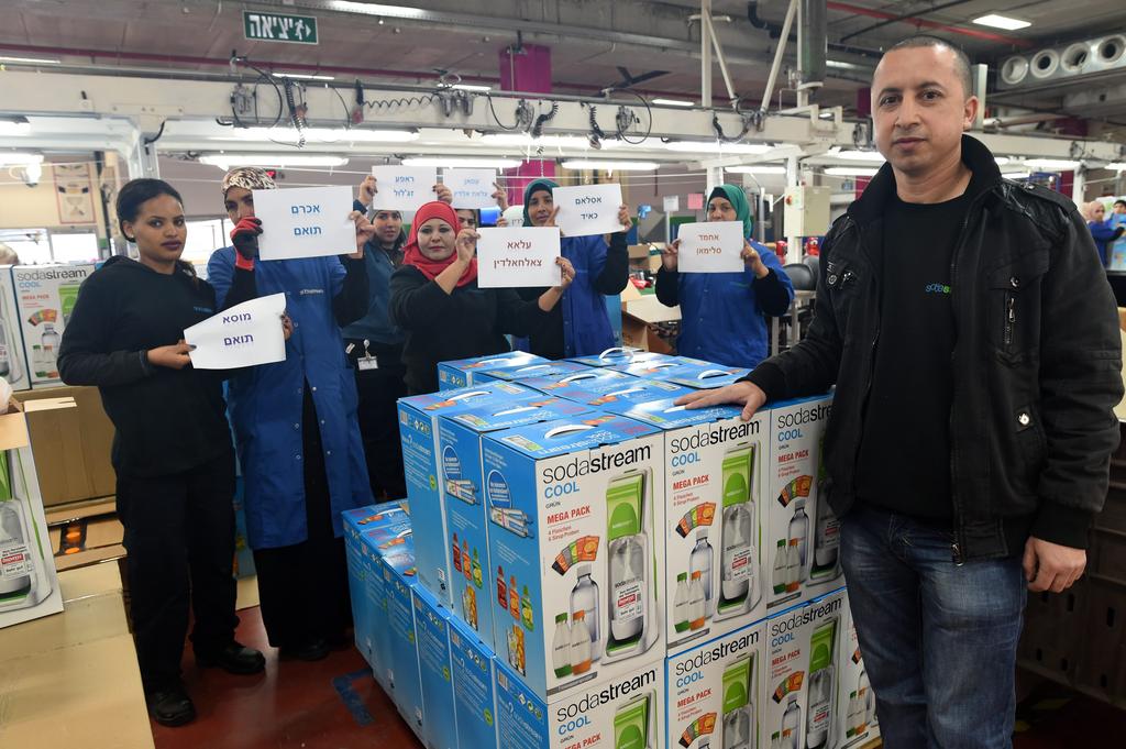 Arab workers at the now shuttered West Bank SodaStream plant 
