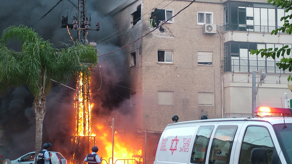 An apartment block in Nahariya after it was hit by a rocket during the 2006 Lebanon war  