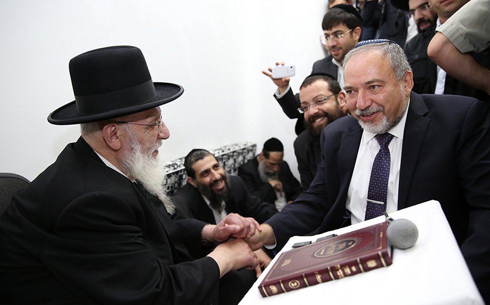 Shas Rabbi Shalom Cohen with Yisrael Beytenu Chairman Avigdor Liberman, who immigrated to Israel from the Soviet Union 